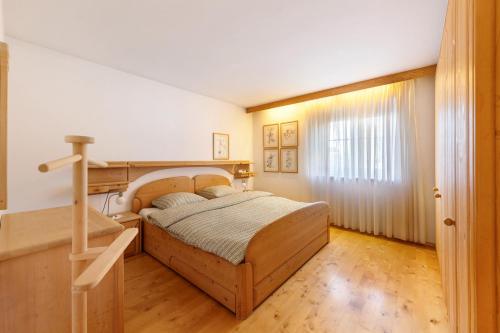 Ένα ή περισσότερα κρεβάτια σε δωμάτιο στο Apartment Kreutnerbinderhof