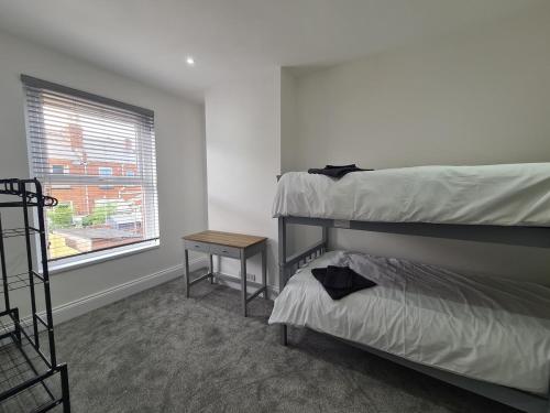 Postel nebo postele na pokoji v ubytování Pearce House-Brand New 3 bed-Sleeps 6-Garden