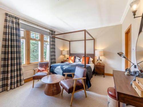 Ένα ή περισσότερα κρεβάτια σε δωμάτιο στο Morar Lodge