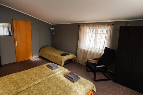 Ένα ή περισσότερα κρεβάτια σε δωμάτιο στο Objekts Guesthouse - Creative Quarter Apartment