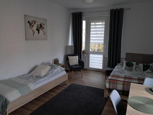 Postel nebo postele na pokoji v ubytování Apartament VERDE Malbork centrum