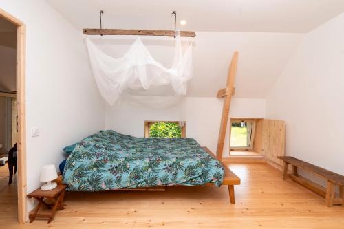 Postel nebo postele na pokoji v ubytování Chez Tetris et Tampa