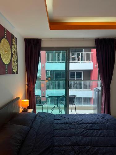 Postel nebo postele na pokoji v ubytování Pattaya, C view , prime location