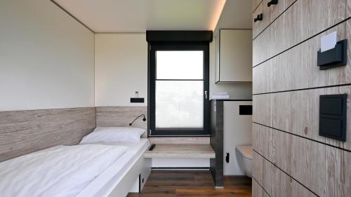 Postel nebo postele na pokoji v ubytování Roatel Staufenberg-Lutterberg A7 my-roatel-com