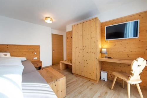 Ένα ή περισσότερα κρεβάτια σε δωμάτιο στο Gass Apartment B