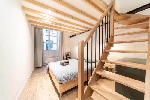 Ένα ή περισσότερα κρεβάτια σε δωμάτιο στο Smartstay Suites Opera Barbara