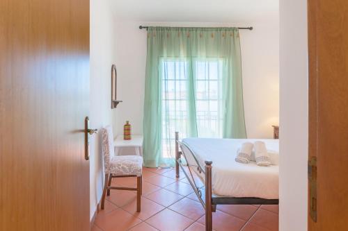 Postel nebo postele na pokoji v ubytování Casa Margarida