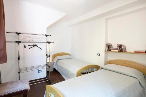 Ένα ή περισσότερα κρεβάτια σε δωμάτιο στο Damaria