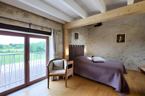 Giường trong phòng chung tại La Grange D'Oustaud