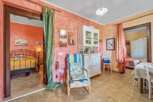 Postel nebo postele na pokoji v ubytování Villetta degli Oleandri