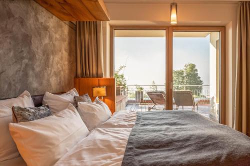 Postel nebo postele na pokoji v ubytování Ferienwohnung Alpa-art