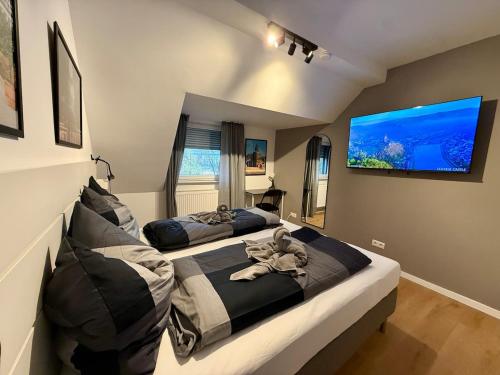 Μια τηλεόραση ή/και κέντρο ψυχαγωγίας στο KO 2-Zimmer Apartment 58 qm bis zu 4 Personen