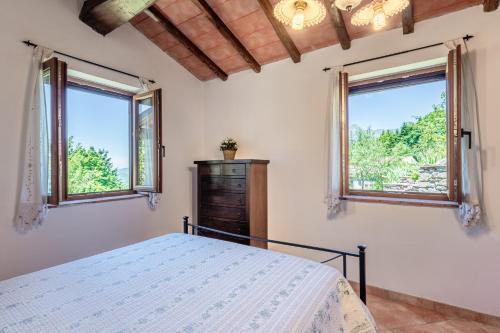 Ένα ή περισσότερα κρεβάτια σε δωμάτιο στο Casa Albereta