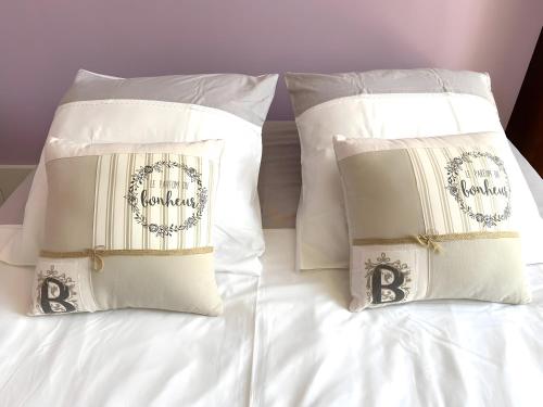 Postel nebo postele na pokoji v ubytování La Tourelle des Cordeliers