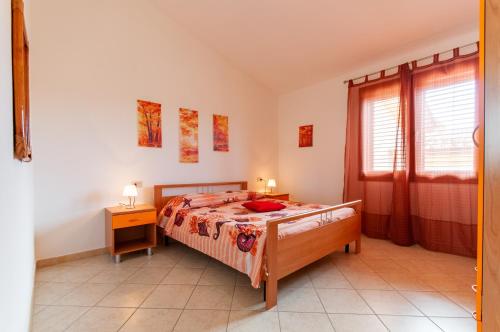 Een bed of bedden in een kamer bij Appartamenti Caletta sul mare