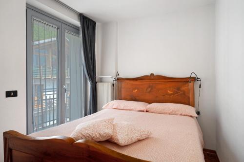 Postel nebo postele na pokoji v ubytování Ciclamino Standard Vittoria