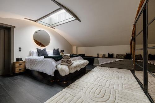 Postel nebo postele na pokoji v ubytování The Penthouse