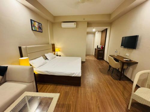 TV a/nebo společenská místnost v ubytování Swanky studio