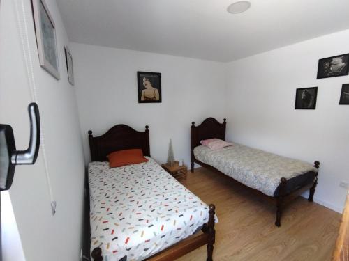 Ένα ή περισσότερα κρεβάτια σε δωμάτιο στο Gite espumante