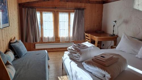 Ένα ή περισσότερα κρεβάτια σε δωμάτιο στο Biala Casa Pintga Streiff