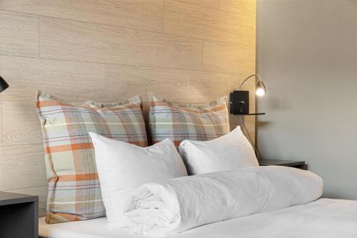 Postel nebo postele na pokoji v ubytování Trysil Hotel