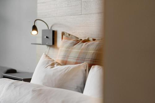 Postel nebo postele na pokoji v ubytování Trysil Hotel