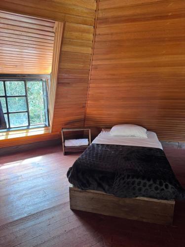 Postel nebo postele na pokoji v ubytování La Roca Glamping