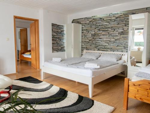 Un ou plusieurs lits dans un hébergement de l'établissement Ferienunterkunfte Wusterhusen