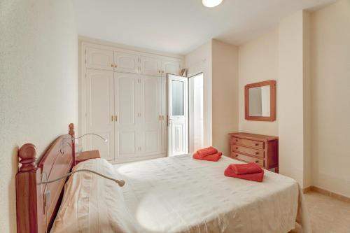 Ένα ή περισσότερα κρεβάτια σε δωμάτιο στο Isla 3