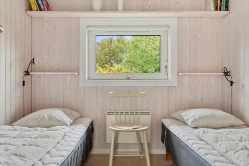 Ένα ή περισσότερα κρεβάτια σε δωμάτιο στο 6845-Allinge-Markvaenget-2