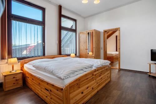 Postel nebo postele na pokoji v ubytování Fewo Villa Zwick An Der Kietzbrücke