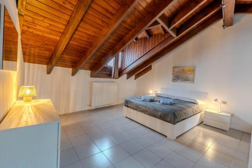 Ένα ή περισσότερα κρεβάτια σε δωμάτιο στο Cozy Apartment Seregno