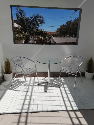 Rõdu või terrass majutusasutuses Piscis