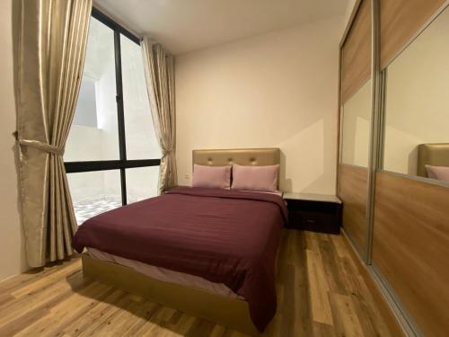 Postel nebo postele na pokoji v ubytování Gala Residences at Galacity