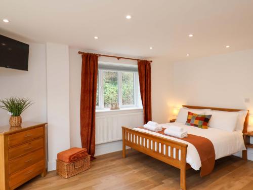 Ένα ή περισσότερα κρεβάτια σε δωμάτιο στο Sandy Nook