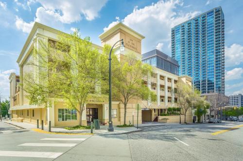 a building on a street with tall buildings at Inn at the Peachtrees, an Ascend Collection Hotel in Atlanta