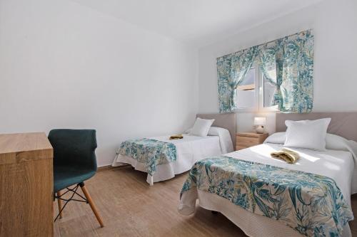 Postel nebo postele na pokoji v ubytování Vista Paraiso