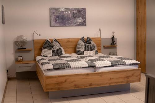 Postel nebo postele na pokoji v ubytování Ferienwohnung Haus Biggi