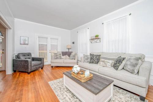 a living room with a couch and a chair at The Terry Sanford Guest House Apt A in Fayetteville