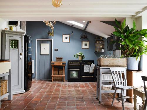 Kuchyň nebo kuchyňský kout v ubytování Camelot