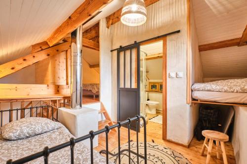 Postel nebo postele na pokoji v ubytování L'atelier M