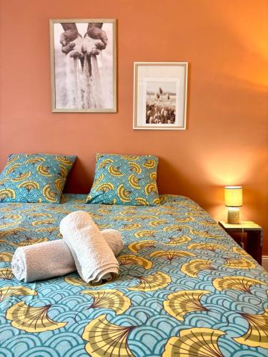 Postel nebo postele na pokoji v ubytování Le Siamois - Appartement de charme bas de Siam