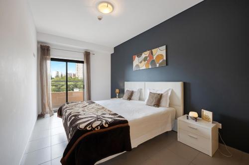 Postel nebo postele na pokoji v ubytování Paraiso a Beira Mar -Sol e Praia