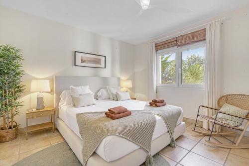 Postel nebo postele na pokoji v ubytování Flores