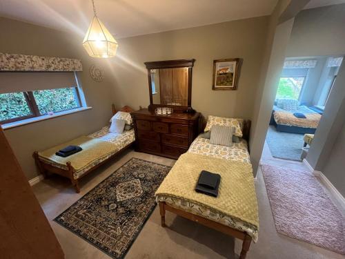 Ένα ή περισσότερα κρεβάτια σε δωμάτιο στο Castletown Carlow