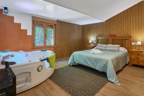 Ένα ή περισσότερα κρεβάτια σε δωμάτιο στο Aguas Frías I