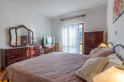 Ένα ή περισσότερα κρεβάτια σε δωμάτιο στο Maria Buzet 2 with Balcony