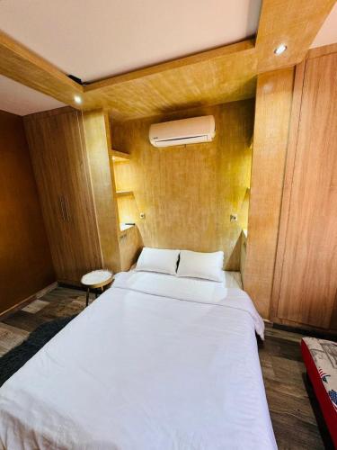 Ένα ή περισσότερα κρεβάτια σε δωμάτιο στο Appartement coup de coeur