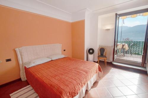 Postel nebo postele na pokoji v ubytování Appartamento Helvetia