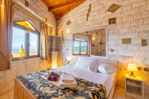 Ένα ή περισσότερα κρεβάτια σε δωμάτιο στο Paco's Resort Luxury Villa 17